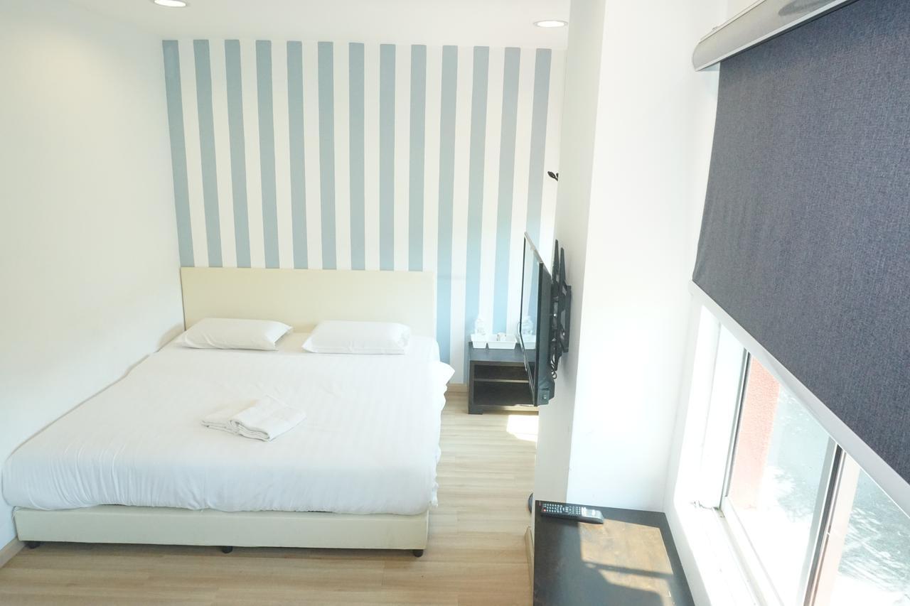 Sun Inns Hotel Аєр-Керох Номер фото